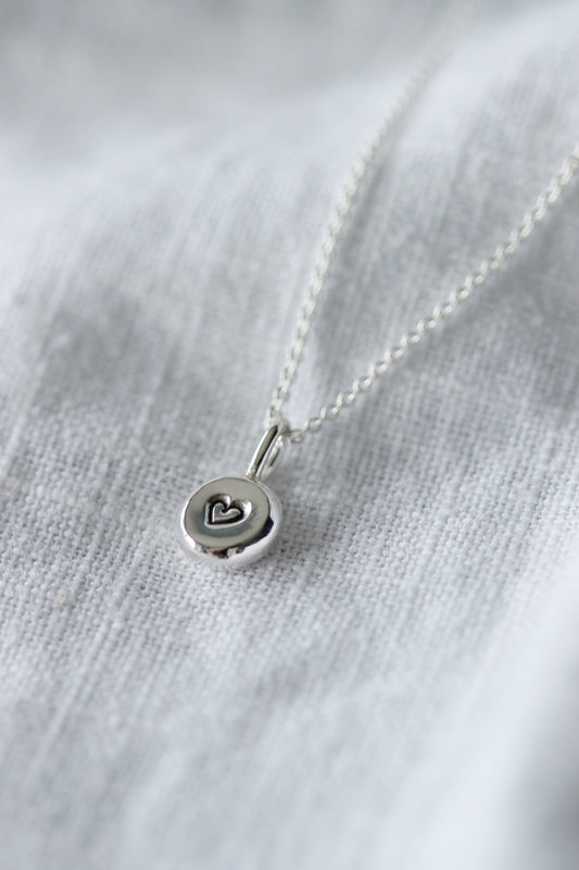 Silver nugget necklace “Symbol”